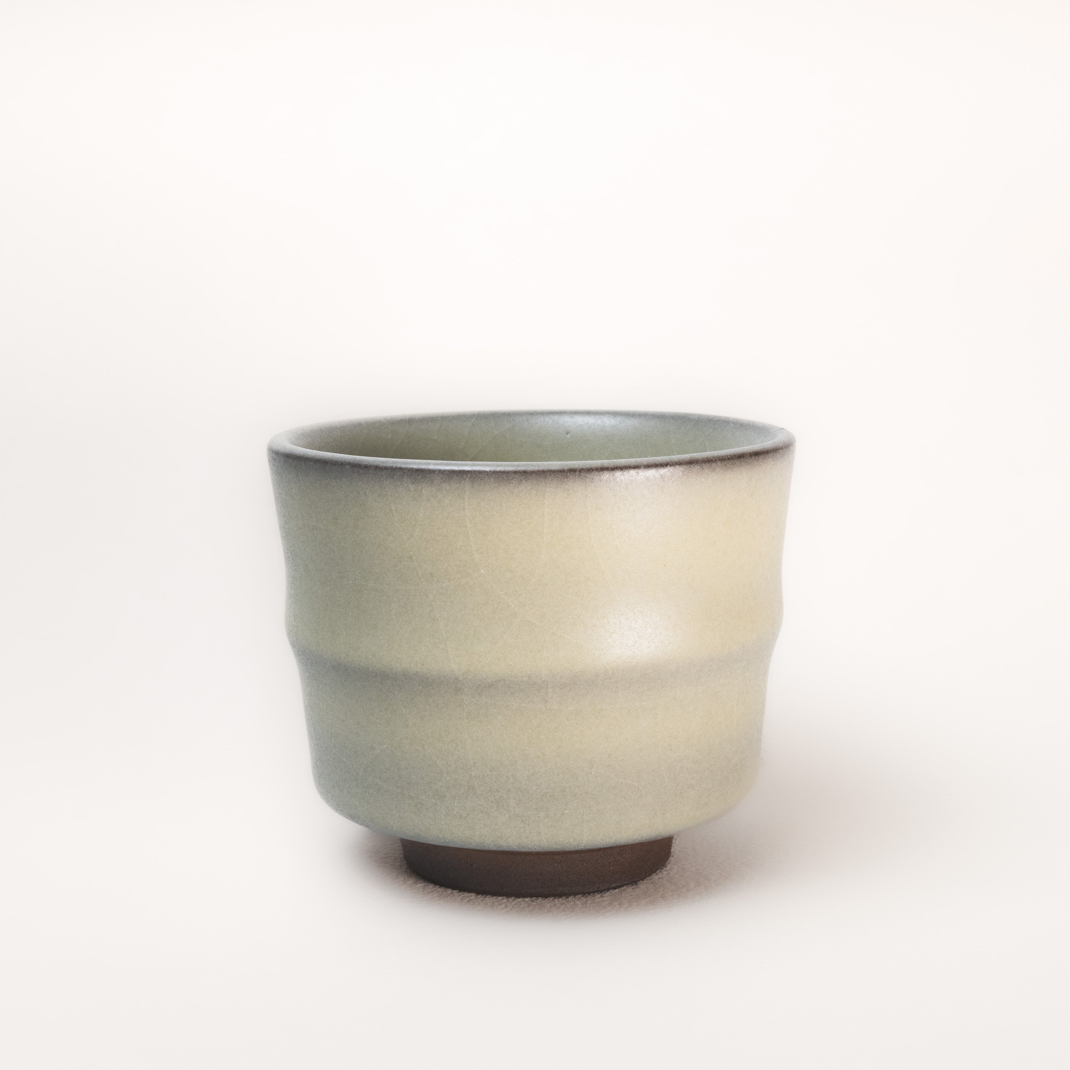Ceramic cup with a gradient finish on a white background