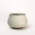 Ceramic pot on a white background